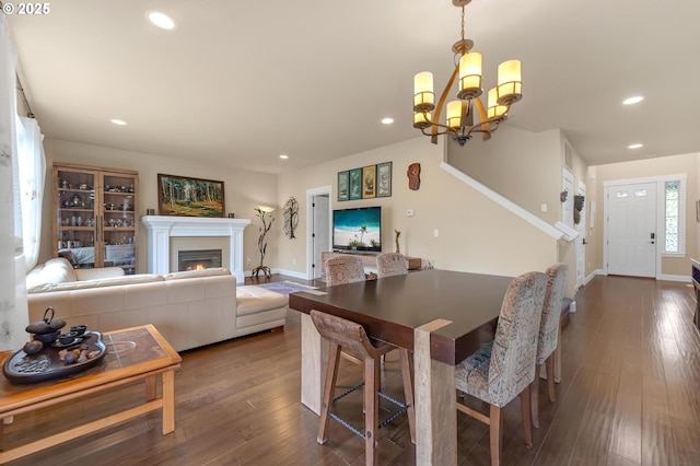 8070 SW 195th Ave, Beaverton, OR 97007 - dining room with recessed lighting, dark wood-style flooring, a chandelier, and baseboards