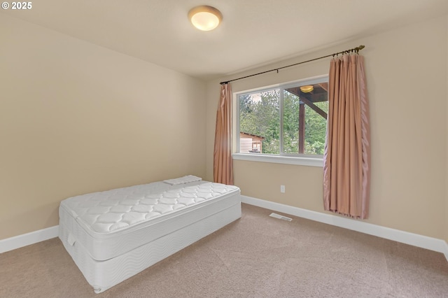 8070 SW 195th Ave, Beaverton, OR 97007 - bedroom with baseboards and carpet floors