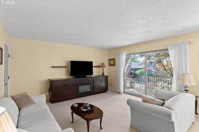 living room with a textured ceiling and light colored carpet