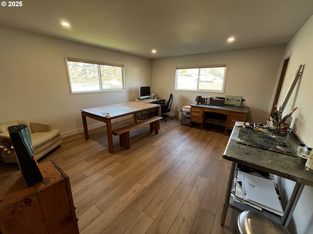 game room with baseboards, light wood-style floors, and recessed lighting