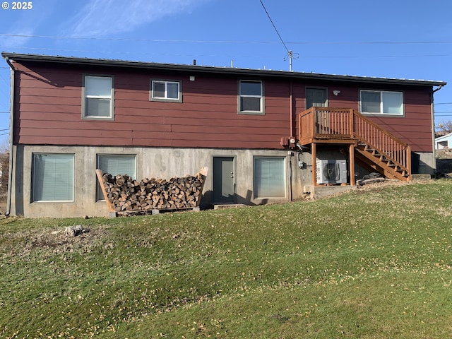 back of property featuring stairs, ac unit, and a yard