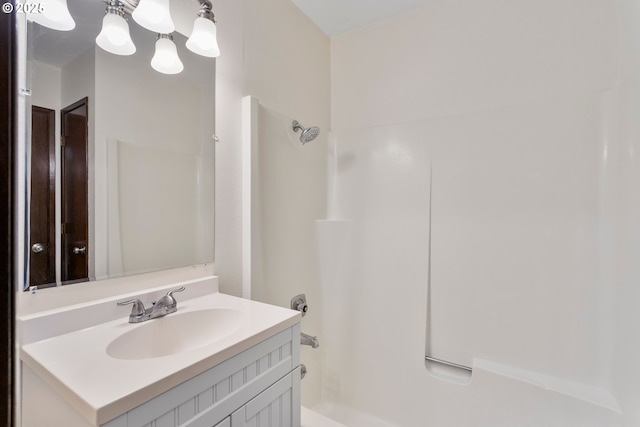 12062 SW Conestoga Dr, Beaverton, OR 97008 - full bathroom featuring shower / bath combination, vanity, and a chandelier