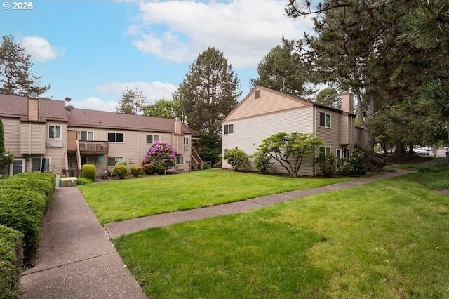 12062 SW Conestoga Dr, Beaverton, OR 97008 - view of home's community with a yard
