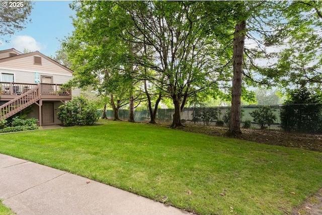 12062 SW Conestoga Dr, Beaverton, OR 97008 - view of yard featuring a wooden deck and stairs