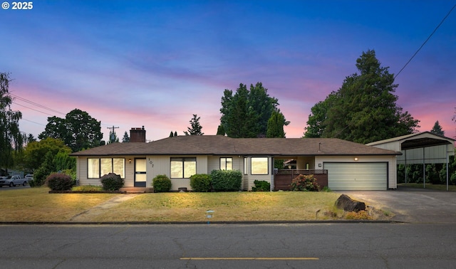 107 NW 10th Ave, Canby, OR 97013 - single story home with a chimney, driveway, a front yard, and a garage