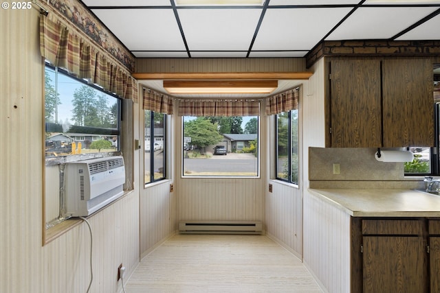 107 NW 10th Ave, Canby, OR 97013 - unfurnished sunroom with a baseboard heating unit and healthy amount of natural light