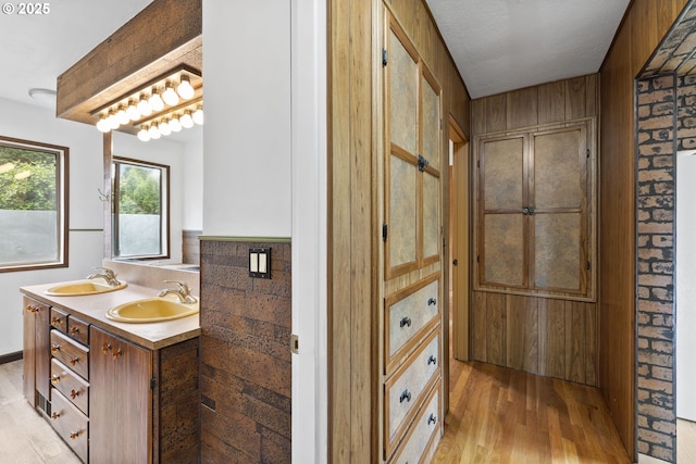 107 NW 10th Ave, Canby, OR 97013 - full bathroom with wood finished floors and double vanity
