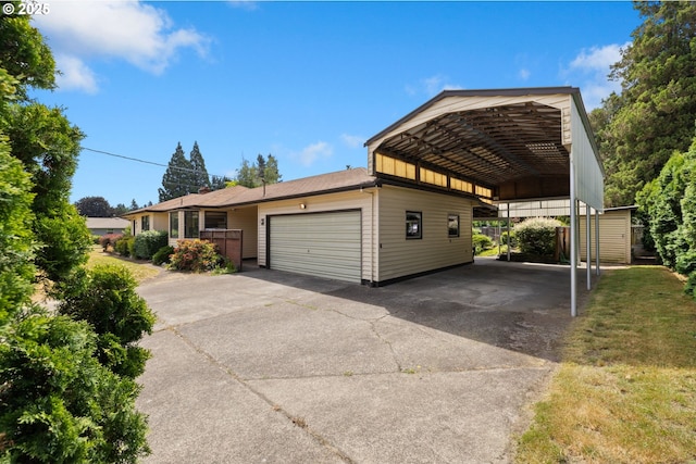 107 NW 10th Ave, Canby, OR 97013 - view of front of property featuring a garage, asphalt driveway, and a front lawn