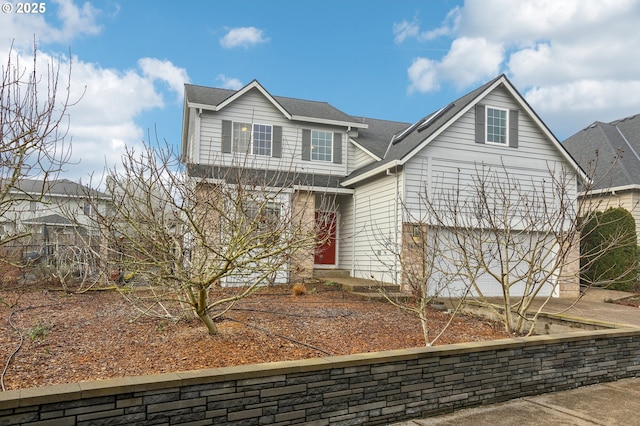 view of front of property with a garage