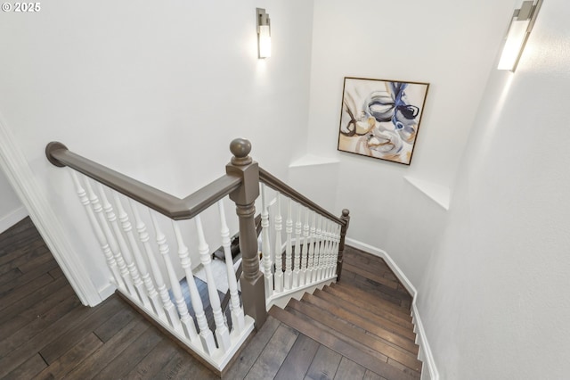 stairs with wood-type flooring