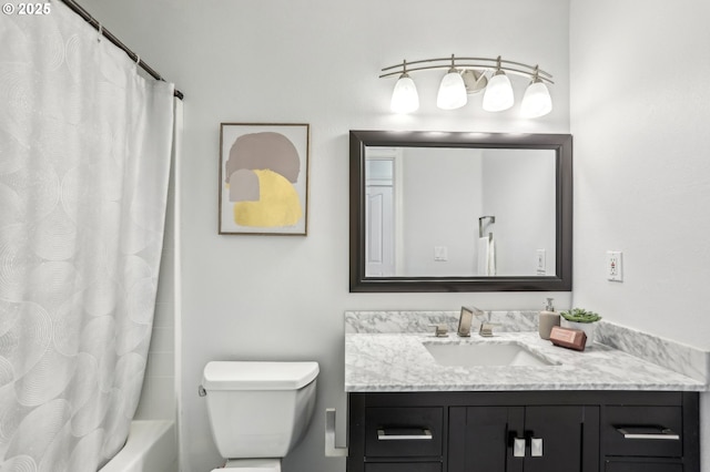 full bathroom featuring toilet, vanity, and shower / bath combo