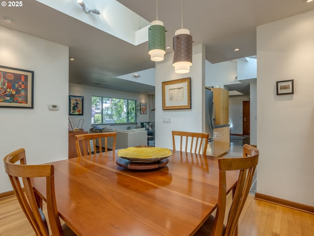 6310 NE 31st Ave Unit A, And B, Portland, OR 97211 - dining room with light wood-style floors, baseboards, and recessed lighting