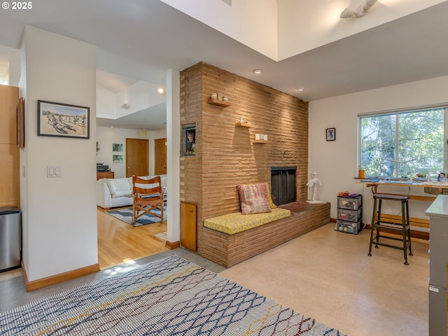 6310 NE 31st Ave Unit A, And B, Portland, OR 97211 - living area featuring a brick fireplace and baseboards