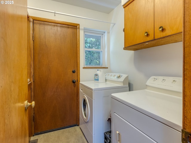 6310 NE 31st Ave Unit A, And B, Portland, OR 97211 - washroom featuring cabinet space and independent washer and dryer