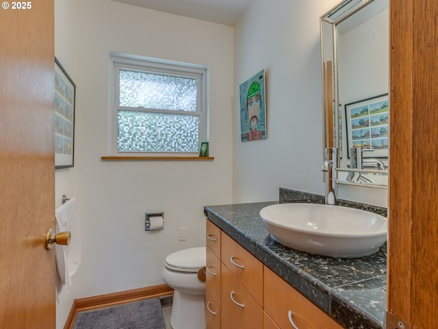 6310 NE 31st Ave Unit A, And B, Portland, OR 97211 - bathroom with vanity, toilet, and baseboards
