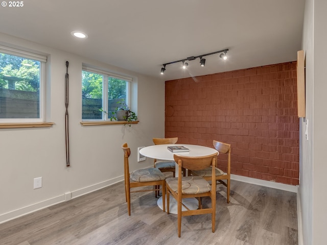 6310 NE 31st Ave Unit A, And B, Portland, OR 97211 - dining space with wood finished floors, track lighting, baseboards, and recessed lighting