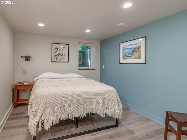 6310 NE 31st Ave Unit A, And B, Portland, OR 97211 - bedroom featuring light wood-style flooring, baseboards, and recessed lighting