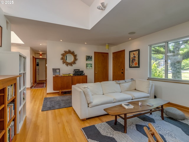 6310 NE 31st Ave Unit A, And B, Portland, OR 97211 - living area featuring light wood finished floors, recessed lighting, and baseboards