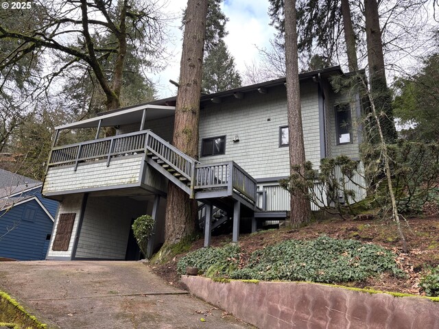 rear view of property with a deck