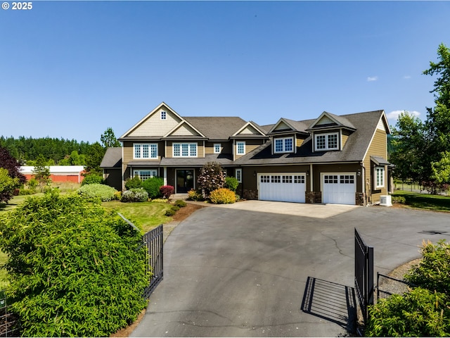 83500 Enterprise Rd, Creswell, OR 97426 - view of front of home with driveway, an attached garage, and stone siding