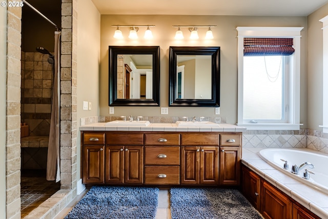 83500 Enterprise Rd, Creswell, OR 97426 - full bathroom featuring a shower stall, double vanity, a garden tub, and tile patterned flooring