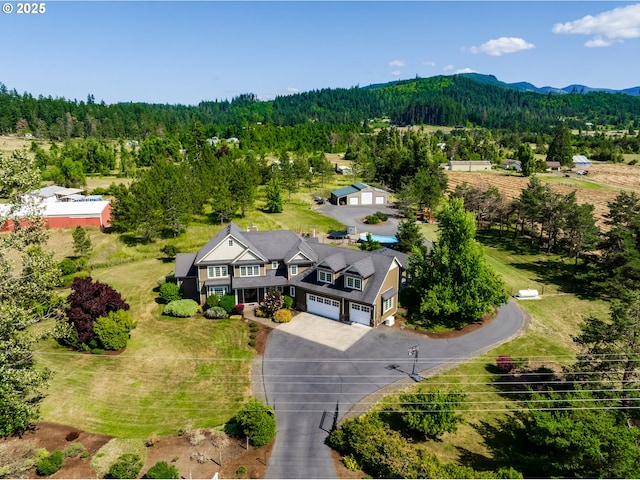 83500 Enterprise Rd, Creswell, OR 97426 - aerial view of property and surrounding area featuring a heavily wooded area and mountains