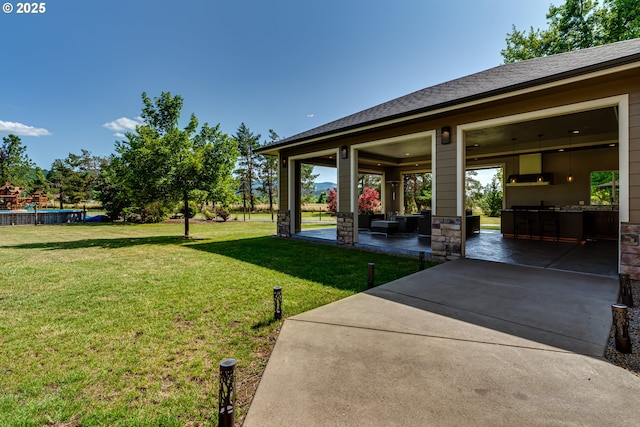 83500 Enterprise Rd, Creswell, OR 97426 - view of grassy yard with a patio
