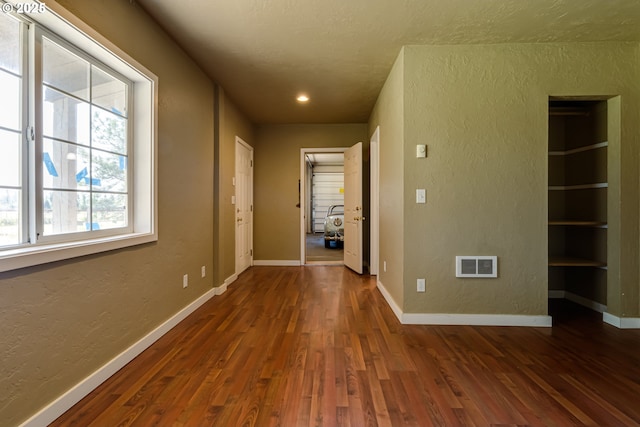83500 Enterprise Rd, Creswell, OR 97426 - corridor with a textured wall, wood finished floors, and recessed lighting