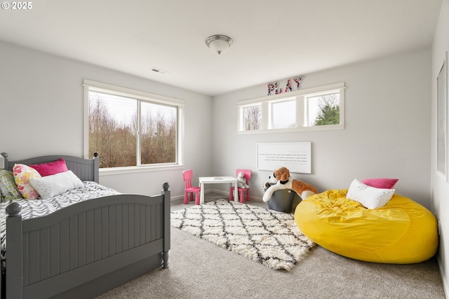 bedroom with carpet and visible vents