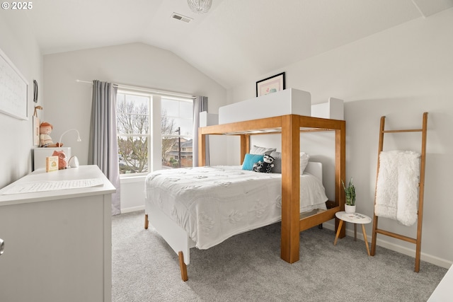 bedroom with light colored carpet, lofted ceiling, visible vents, and baseboards