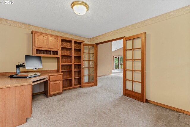 4311 NW 419th St, Woodland, WA 98674 - unfurnished office featuring light carpet, french doors, and built in desk