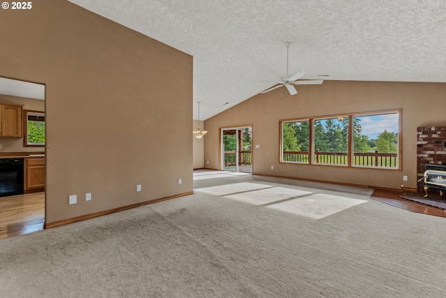 4311 NW 419th St, Woodland, WA 98674 - unfurnished living room with light carpet, ceiling fan, plenty of natural light, a textured ceiling, and a chandelier