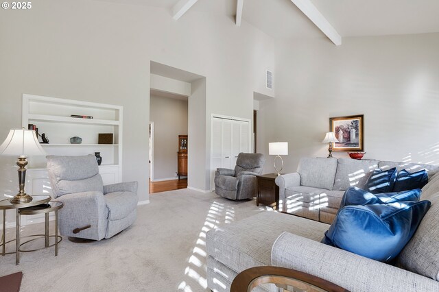 dining area with hardwood / wood-style flooring, a notable chandelier, and a brick fireplace