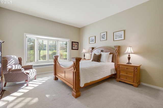 bedroom with light carpet