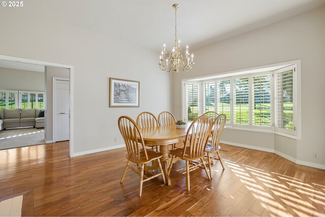 carpeted living room with beam ceiling, built in features, high vaulted ceiling, and plenty of natural light