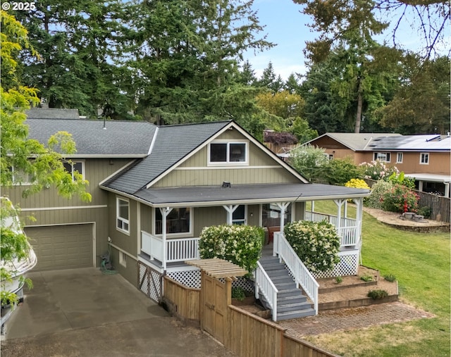 7375 SW 185th Ave, Beaverton, OR 97007 - view of front of house featuring a porch, roof with shingles, an attached garage, and driveway