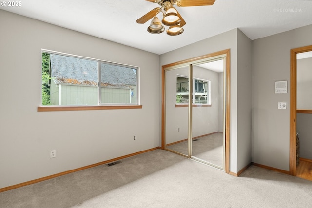 7375 SW 185th Ave, Beaverton, OR 97007 - unfurnished bedroom with carpet floors, a closet, and a ceiling fan