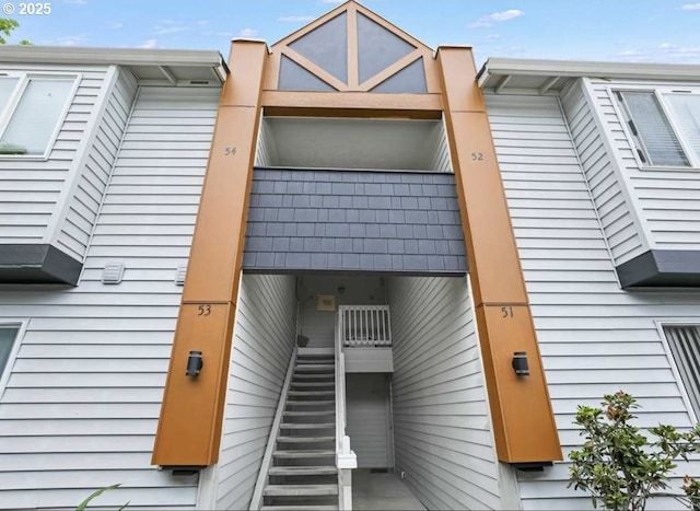 10690 SW Davies Rd Unit 53, Beaverton, OR 97008 - view of side of home featuring stairs