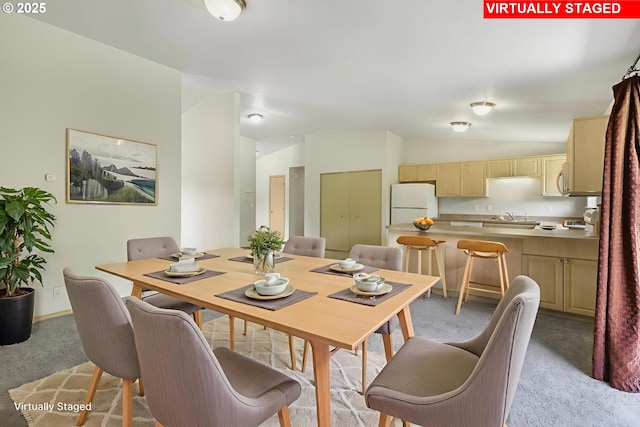 5580 Franklin Blvd, Eugene, OR 97403 - dining room with light colored carpet and vaulted ceiling