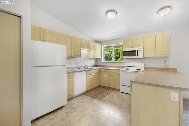 5580 Franklin Blvd, Eugene, OR 97403 - kitchen with light brown cabinets, white appliances, a peninsula, vaulted ceiling, and light countertops