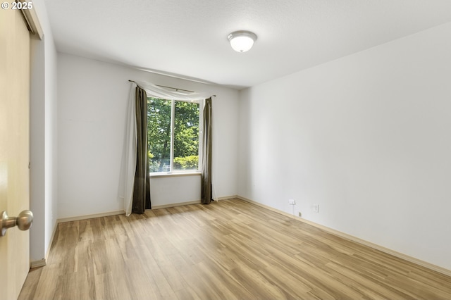 5580 Franklin Blvd, Eugene, OR 97403 - spare room with light wood-style flooring and baseboards