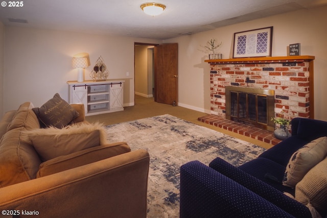carpeted living area featuring visible vents, baseboards, and a brick fireplace