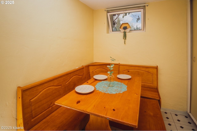 unfurnished dining area with light floors