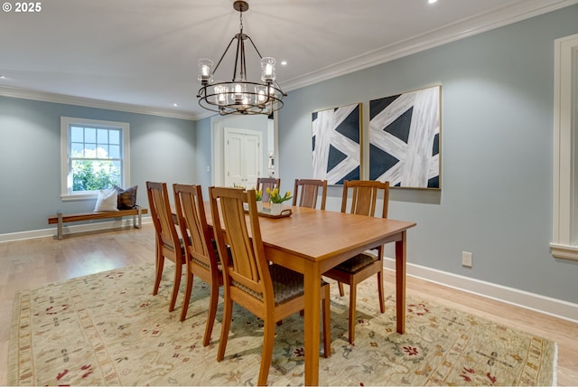 2645 SW Upper Drive Pl, Portland, OR 97201 - dining space with light wood-type flooring, a chandelier, ornamental molding, recessed lighting, and baseboards
