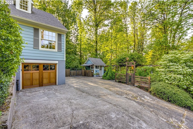 2645 SW Upper Drive Pl, Portland, OR 97201 - garage featuring concrete driveway