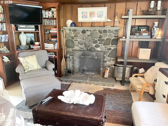 554 N Beacon St, Rockaway Beach, OR 97136 - living area featuring a stone fireplace