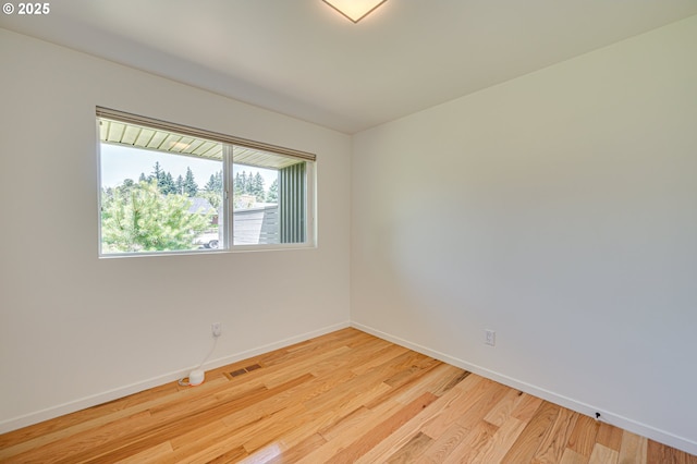 607 W 35th St, Vancouver, WA 98660 - spare room featuring baseboards and light wood-style flooring