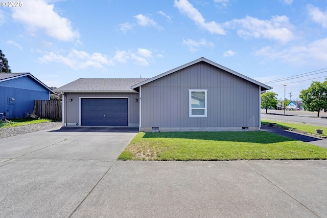 ranch-style home with crawl space, driveway, and an attached garage