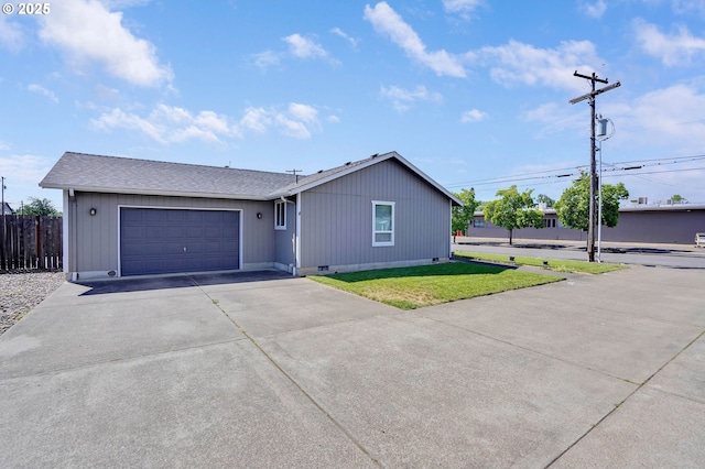 single story home featuring driveway, crawl space, and a garage