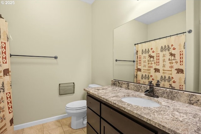 full bath with vanity, tile patterned flooring, toilet, curtained shower, and baseboards